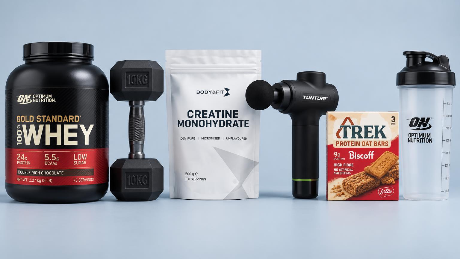 Eiwitpoeder, dumbbell, creatine, massagepistool, eiwitrepen en shaker van bekende merken